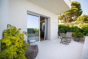 גינה חיצונית ב-Unìco Boutique Hotel d'Arte