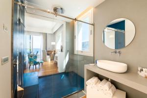 חדר רחצה ב-Unìco Boutique Hotel d'Arte