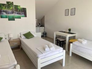 Postel nebo postele na pokoji v ubytování Studio apartmani Alex Doll