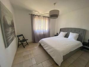 Postel nebo postele na pokoji v ubytování Villa Arethuse - Pyla sur Mer