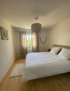 Postel nebo postele na pokoji v ubytování Villa Arethuse - Pyla sur Mer