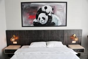 A bed or beds in a room at SAR-PER Hotel