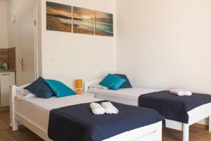 Postel nebo postele na pokoji v ubytování Studio apartmani Alex Doll