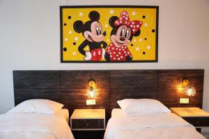 A bed or beds in a room at SAR-PER Hotel