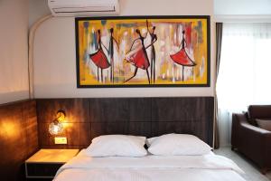 A bed or beds in a room at SAR-PER Hotel