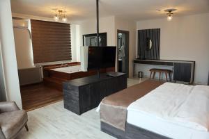 A bed or beds in a room at SAR-PER Hotel