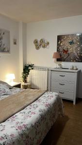 Ένα ή περισσότερα κρεβάτια σε δωμάτιο στο Fiera di Roma B&B