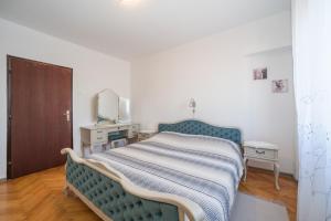 Posteľ alebo postele v izbe v ubytovaní Red Karmenita