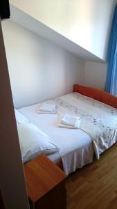 Postel nebo postele na pokoji v ubytování Guest House Lav
