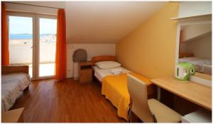 Postel nebo postele na pokoji v ubytování Guest House Lav