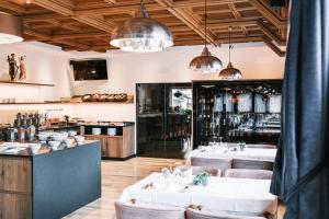 Kuchyň nebo kuchyňský kout v ubytování Kristiania Small Dolomites Hotel