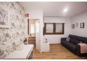 A seating area at Apartamento Felisa A