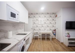 A kitchen or kitchenette at Apartamento Felisa A