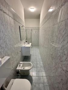 Koupelna v ubytování Casa Sebastopoli - vicino Pala Alpitour