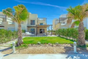 Zahrada ubytování NEW! Gouna, Cyan Cozy 3BR Townhouse Lagoon & Pool