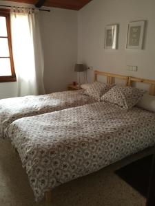 Postel nebo postele na pokoji v ubytování Sa Bassa Crua Agroturismo