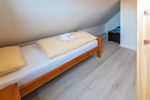 Postel nebo postele na pokoji v ubytování Ferienhaus-Lucy