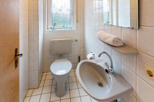 Koupelna v ubytování Ferienhaus-Lucy + 17 fotografií