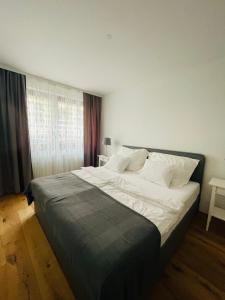 Postel nebo postele na pokoji v ubytování City State