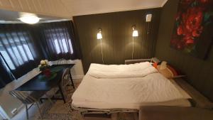 Postel nebo postele na pokoji v ubytování Olden Camping