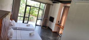 Posezení v ubytování Mango Tree Villa Bentota