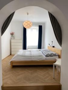 Postel nebo postele na pokoji v ubytování Gästezimmer Weingut Höllerer