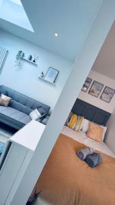 an overhead view of a living room with a couch at Contemporary studio apartment in Pemberton