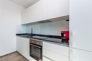 Kuchyňa alebo kuchynka v ubytovaní Apartments LUCA