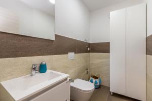 Kúpeľňa v ubytovaní Apartments LUCA
