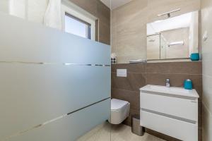 Kúpeľňa v ubytovaní Apartments LUCA
