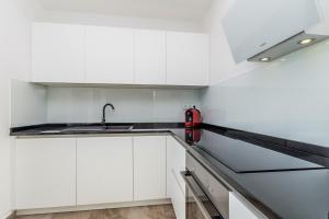 Kuchyňa alebo kuchynka v ubytovaní Apartments LUCA