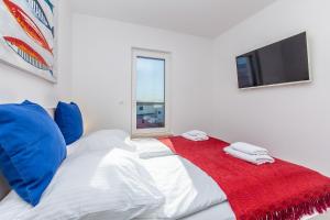 Posteľ alebo postele v izbe v ubytovaní Apartments LUCA