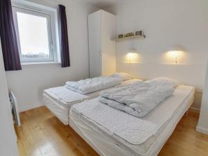 Katil atau katil-katil dalam bilik di Apartment Arngerus in Western Jutland by Interhome