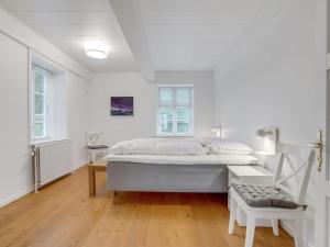Postel nebo postele na pokoji v ubytování Holiday Home Thordis by Interhome