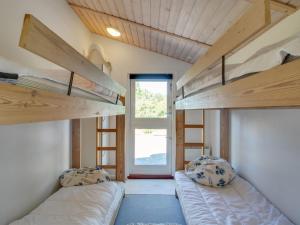 Postel nebo postele na pokoji v ubytování Holiday Home Olof - 100m from the sea by Interhome