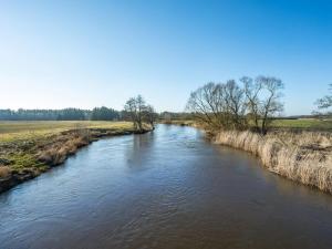 uma vista para um rio a partir de uma ponte em Apartment Evina - 17km to the inlet in Western Jutland by Interhome em Skjern