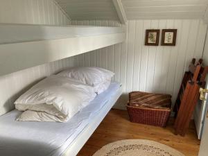 En eller flere senge i et værelse på Holiday Home Rolf in SE Jutland by Interhome
