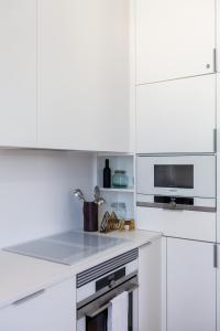 Cucina o angolo cottura di FLH Amazing Praça Comércio Design Flat