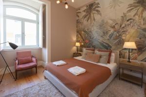 Letto o letti in una camera di FLH Amazing Praça Comércio Design Flat