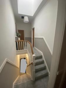 a staircase in a house with a stair case at Amazing Two Bedroom Apartment - SR in Southport