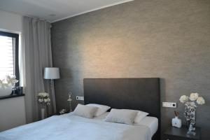 Posteľ alebo postele v izbe v ubytovaní Apartmany u Polanských