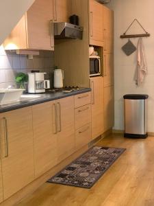 Kuchyň nebo kuchyňský kout v ubytování De Bosdreef - Hengelhoef - duplex met verwarmd openluchtzwembad