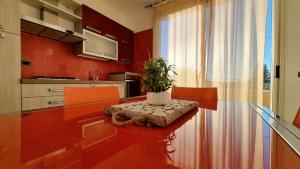 Virtuvė arba virtuvėlė apgyvendinimo įstaigoje La Suite di Poseidone