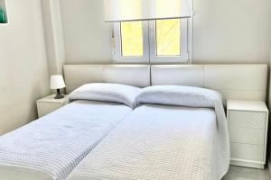 Posteľ alebo postele v izbe v ubytovaní MI CAPRICHO BEACHFRONT- 9F Apartment with sea views - Costa del Sol