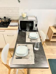 Kuchyň nebo kuchyňský kout v ubytování Hyper centre appartement Cosy WIFI