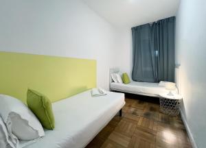 Postel nebo postele na pokoji v ubytování Stay U-nique Apartments Diagonal
