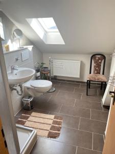 Koupelna v ubytování Private Zimmer Große