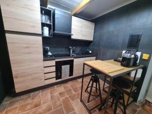A kitchen or kitchenette at Onlyfor2 un nido d'amore per la coppia