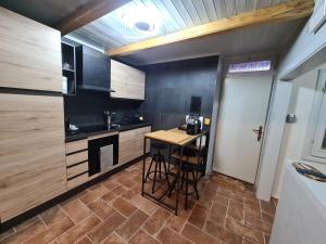 A kitchen or kitchenette at Onlyfor2 un nido d'amore per la coppia