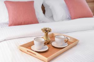 Letto o letti in una camera di Magnolia Place